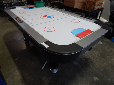 Dimensions: 84 inches long x 48 inches wide x 32 inches high. . Sportcraft turbo air hockey table
